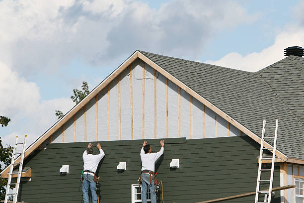 Professional Siding Contractor technician working in Starford, PA